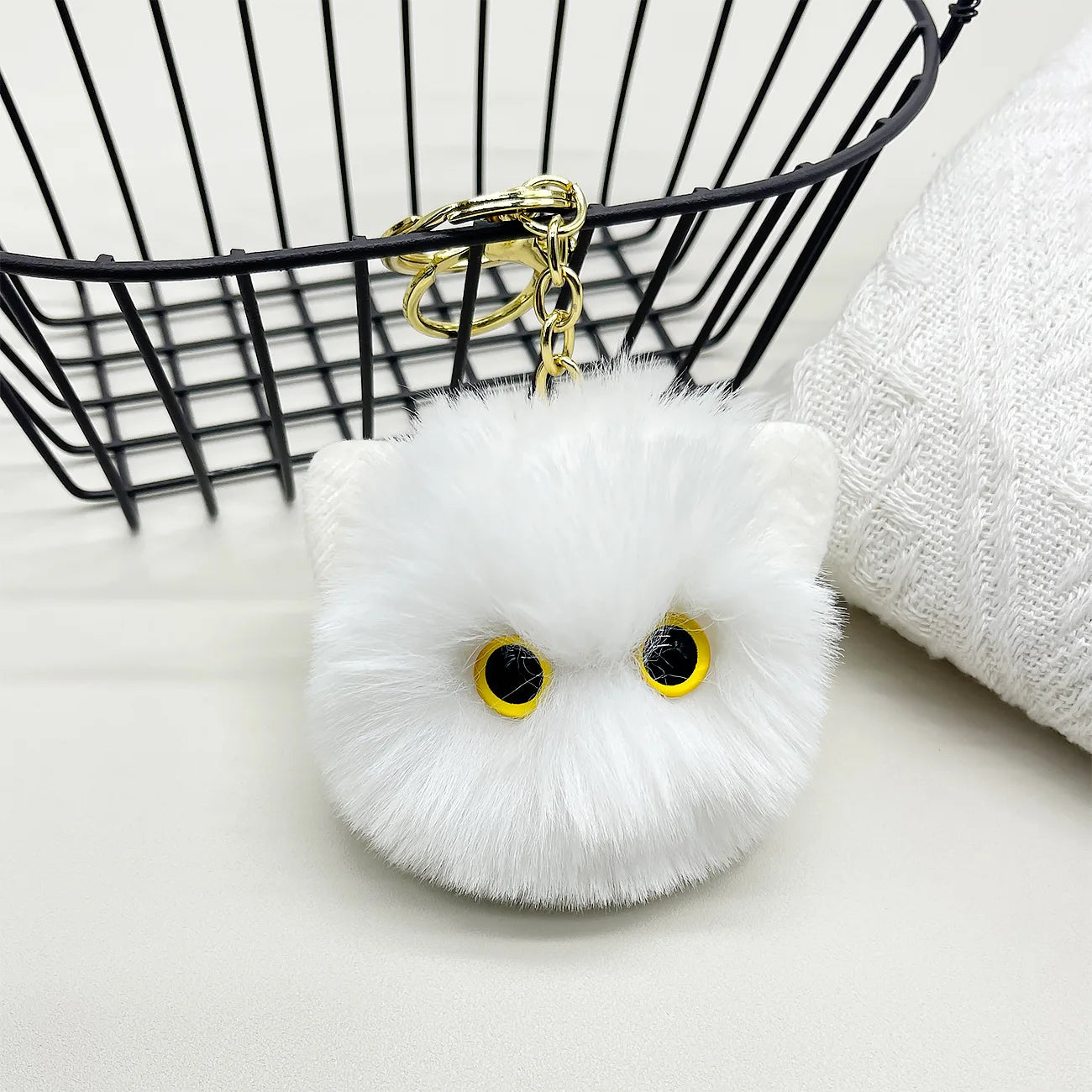 white cute fluffy keychain with cute eyes