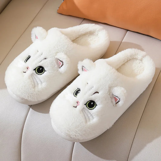 a cute white cotton and very comfy sandals with cute cat faces and ears in the front