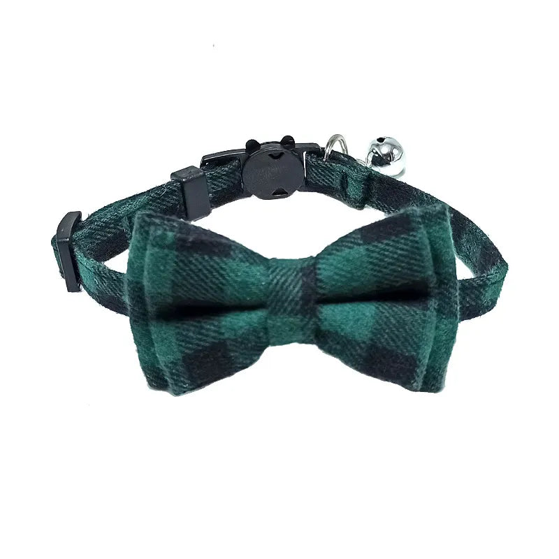 a cute green and black cat bowtie collar with a bell
