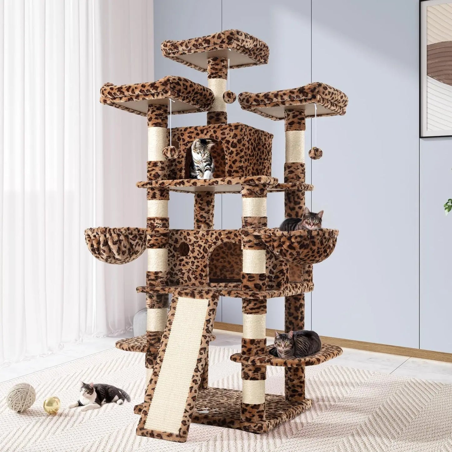 a huge tiger pattern cat castle with 4 cats sleeping and sitting on it and playing around it