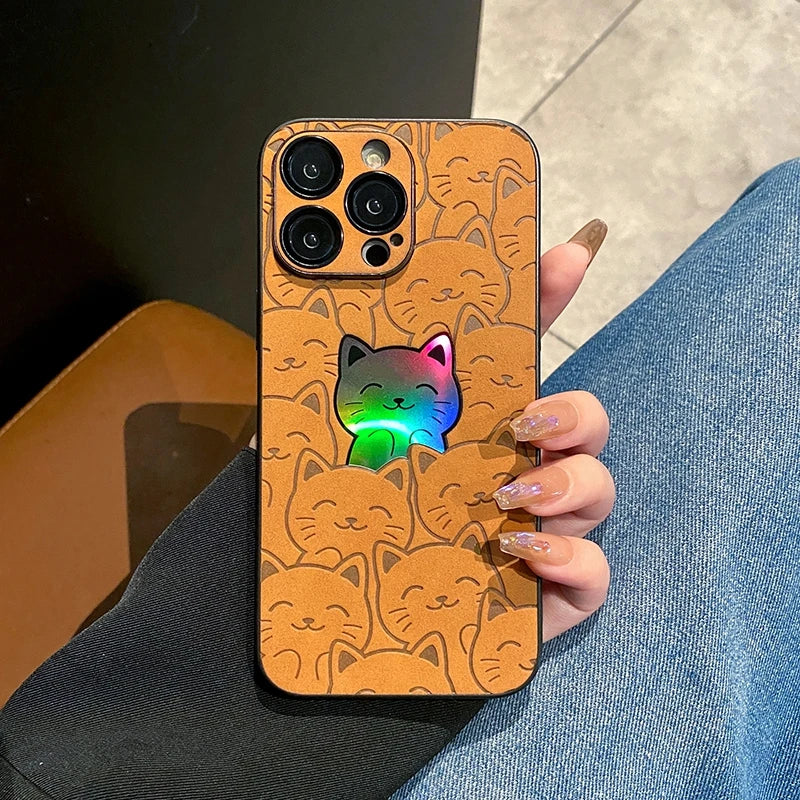 a hand holding a super cute yellow cat I phone case with a colorful cat in the back