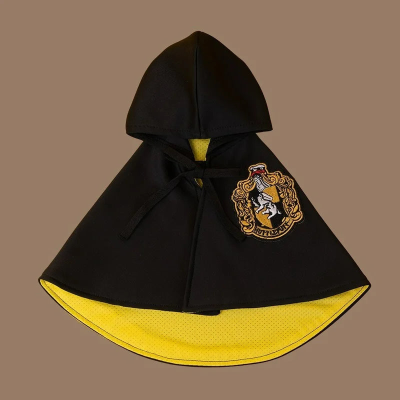 black and yellow harry potter cloak used for cats